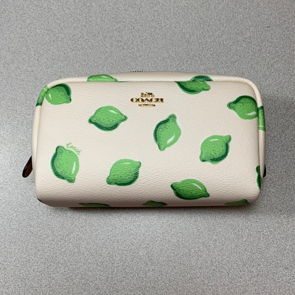Coach Handbags - Coach Lime cosmetic clutch